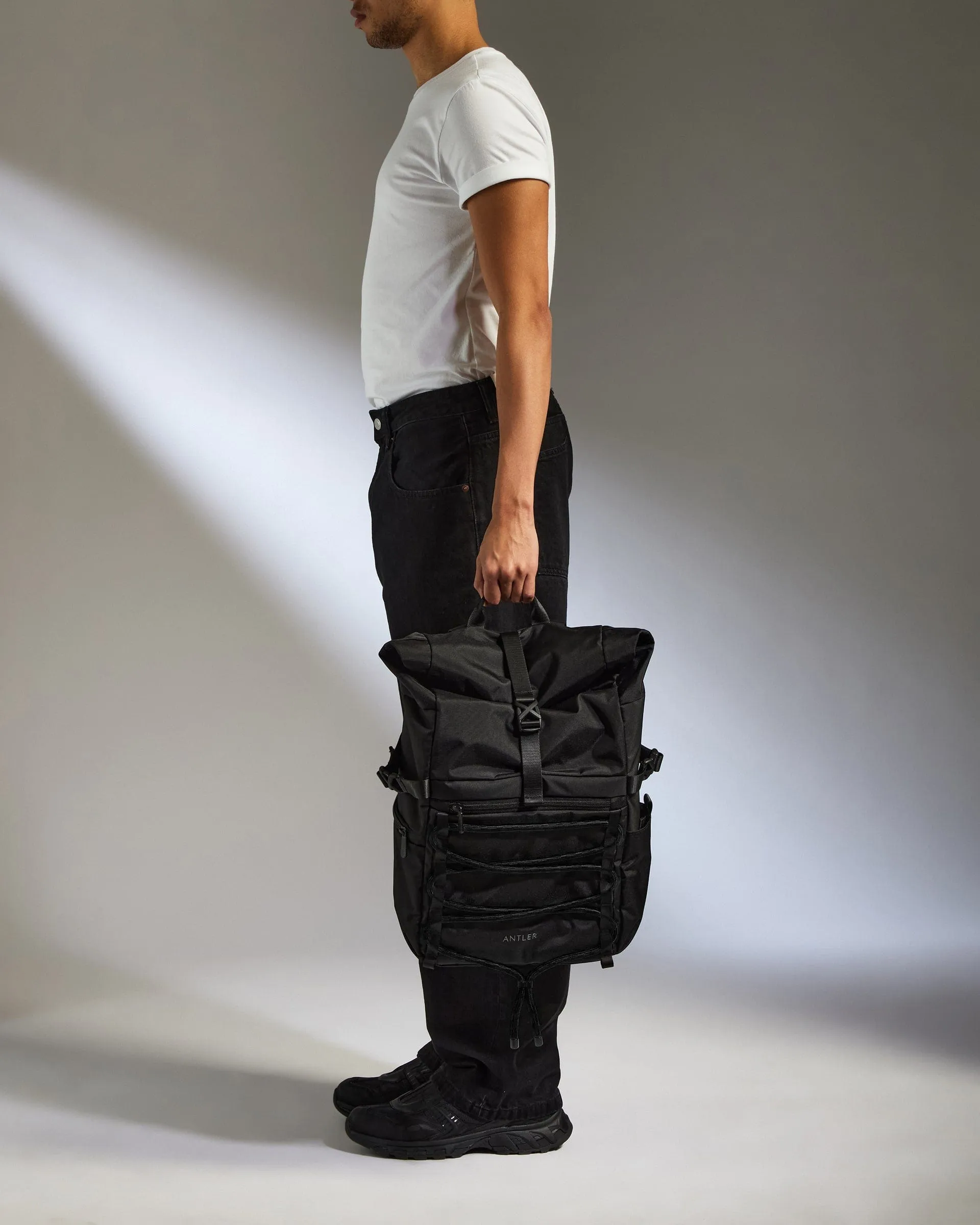 Discovery Roll Top Backpack in Black