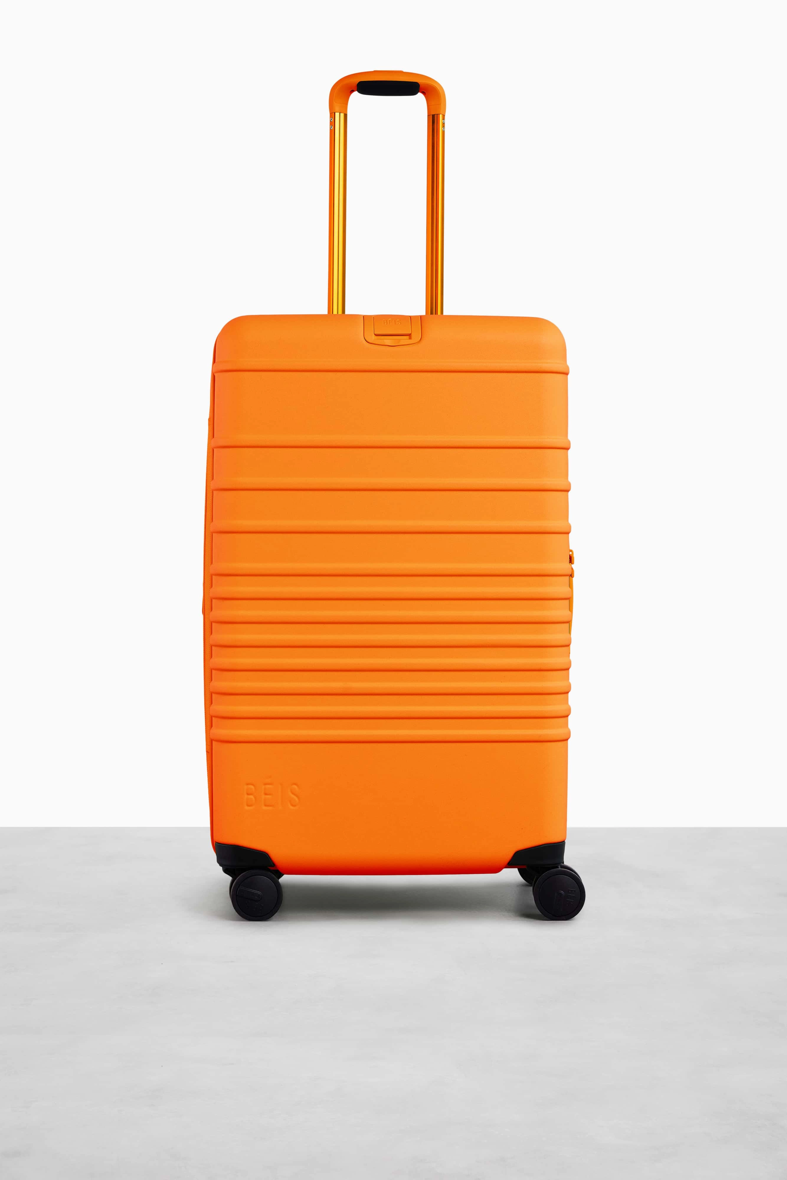 The Medium Check-In Roller in Creamsicle